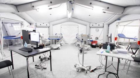 Salud habilita desde el lunes 160 habitaciones del hotel NH Iruña Park para pacientes en hospitalización domiciliaria Imágenes de la habilitación del hotel Iruña Park y el sótano de Urgencias del CHN