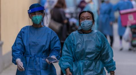 Brote de covid en China Personal médico en Shanghai