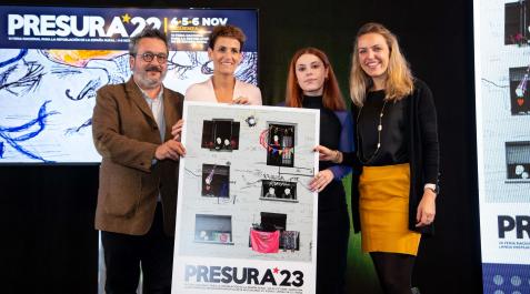 chivite-presura Presidenta Chivite con el cartel de la próxima edición de Presura, que se celebrará en Pamplona, junto al coordinador del Hueco, Joaquín Alcalde, la diseñadora del cartel, Laura Carmona, y la alcaldesa de Sigüenza, Mª Jesús Merin