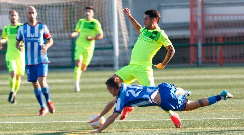 Un momento del partido de este domingo Un momento del partido de este domingo