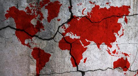MapaMundo Silueta del mundo con los continentes teñidos de rojo.