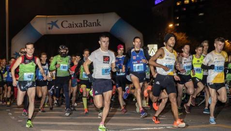 Fotos de la San Silvestre de Pamplona 2019, en la que han participado 5.200 corredores con dorsales.
