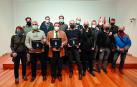 Fotógrafos de Aregna que han participado en 'Crónica gráfica de la pandemia en Navarra', en la presentación este jueves en el Parlamento.
