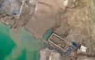 Imagen tomada el 1 de septiembre de 2022 desde un dron del viejo balneario de aguas termales que emerge en el pantano de Yesa por el bajo nivel del embalse