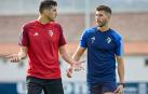 Sergio Herrera y David García conversan en la sesión de recuperación que tuvo lugar ayer en Tajonar