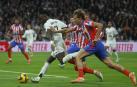 Vinicius y Marcos Llorente, en una acción del partido