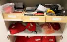 Móviles, carteras, documentación y ropa recogidos en la oficina de Objetos Perdidos durante las fiestas de San Fermín 2014.