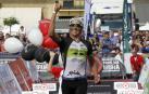 Un millar de triatletas desafiaron al calor en el Half Triathlon Pamplona-Iruña, que repartió los títulos de media distancia.