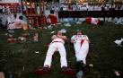 Fotos del ambiente en las calles de Pamplona el tercer día de las fiestas de San Fermín.