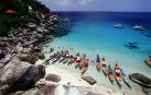 Botes en una playa de Tailandia, el primer destino de los que pasan por el Centro de Vacunación.