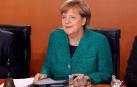Merkel empieza con optimismo las negociaciones para formar Gobierno