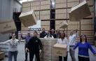 Parte de los trabajadores de Atecna, en los almacenes de Esquíroz. De izquierda a derecha: Almudena Jiménez, Fernando Iribarren  (director de proyectos), Jorge Pérez (responsable de archivo), Mikel Lacunza (responsable de mantenimiento), Emy Paredes (responsable de departamento IT), Pedro Latasa (responsable I+D+i), María Rives, Mabel Lara, Gorka Lacunza (gerente) y  Beatriz Pozo (responsable de administración).