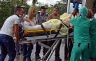 Policías y militares custodian los restos del avión Boeing-737 que se estrelló hoy, viernes 18 de mayo de 2018, poco después de despegar del aeropuerto José Martí de La Habana (Cuba).