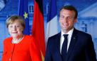 Merkel y Macron abren la puerta a acuerdos migratorios entre países de la UE