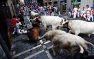 Imágenes del quinto encierro de los sanfermines, con toros de la ganadería Núñez del Cuvillo