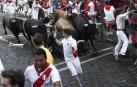 Imágenes del octavo encierro de los Sanfermines de 2018, con toros de la ganadería Miura.