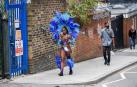 El popular carnaval de Notting Hill, en el oeste de Londres, vivió este lunes su "día grande" con un desfile repleto de color y ritmos caribeños y bajo una fuerte presencia policial.