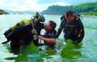 Dos niños protagonizan la última sesión de buceo adaptado en Getaría