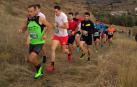 Álvaro Ramos cruzó la meta sobre los hombros de su compañero Javier Lizarra en la prueba de 14 kilómetros