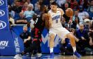 Ibaka defiende a Nikola Vucevic en el partido ante Orlando.