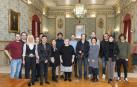 Algunos de los beneficiarios, junto a las autoridades presentes, durante el acto celebrado este lunes en Tudela.