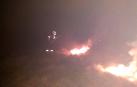Bomberos Forestales extinguiendo un incendio forestal en Arantza