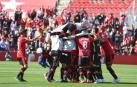 Los jugadores del Mallorca celebran la victoria in extremis ante el Sporting.