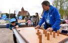 Voluntarios de 'la Caixa' pasan un día con 155 niños en riesgo de exclusión