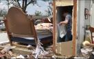 El centro de Estados Unidos sufre la destrucción provocada por una oleada de tornados