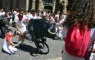 Imágenes del encierro txiki del día 13 de San Fermín