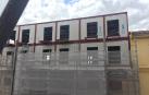 Montaje de los tres pisos extra de un edificio de Carlos III en Pamplona