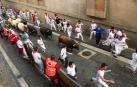 Imágenes del séptimo encierro de los Sanfermines 2019 protagonizado por toros de La Palmosilla.