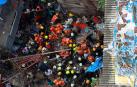 Dos personas muertas y más de 40 atrapadas al caerse un edificio centenario en Bombay