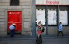 Una oficina del Banco Popular, comprado por un euro por el Banco Santander en 2017