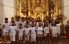 Los niños de Arguedas, con San Esteban Chiqui