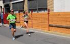 Participantes en la carrera popular disputada este domingo 11 de agosto.,