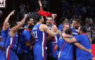 Los jugadores dominicanos celebran su victoria ante Alemania.