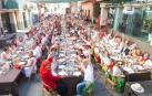 Fotos de la comida popular de los 'baby boomers' en fiestas de Corella, que reunió este jueves a casi 600 personas de entre 35 y 55 años.