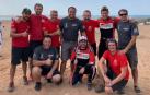 Fernando Alonso y Marc Coma junto a su equipo tras finalizar el Ula Neom Rally.
