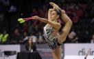 Las gimnastas se juegan en apenas dos minutos y medio el trabajo de varios meses de preparación previa y de más de dos horas          de calentamiento el día de competición
