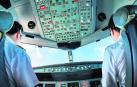 Interior de la cabina de un avión con dos pilotos