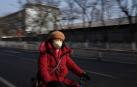 China eleva a 25 los muertos por el nuevo coronavirus y a 830 los casos confirmados