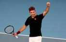 Federer celebra su sufrida victoria ante el australiano John Millman.