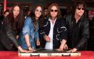 foto de Los miembros del grupo de rock The Black Crowes en una foto de 2001