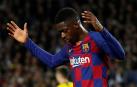 Dembélé, en un partido con el Barcelona.