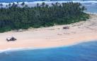 Un SOS escrito en la arena ayuda a tres hombres perdidos en una isla remota