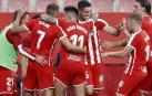 Los jugadores del Girona celebran el único gol del partido.