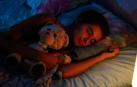 Imagen de un niño durmiendo en su cama