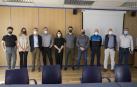 Estudiantes de periodismo junto a las autoridades en el Ayuntamiento de Pamplona.
