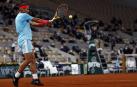 Galería de fotos de la victoria de Rafa Nadal ante Novak Djokovic en Roland Garros. El tenista balear suma su 13º triunfo en París.
